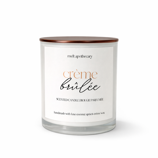 Candle labeled 'creème brélé' by Melt Apothecary on a white background