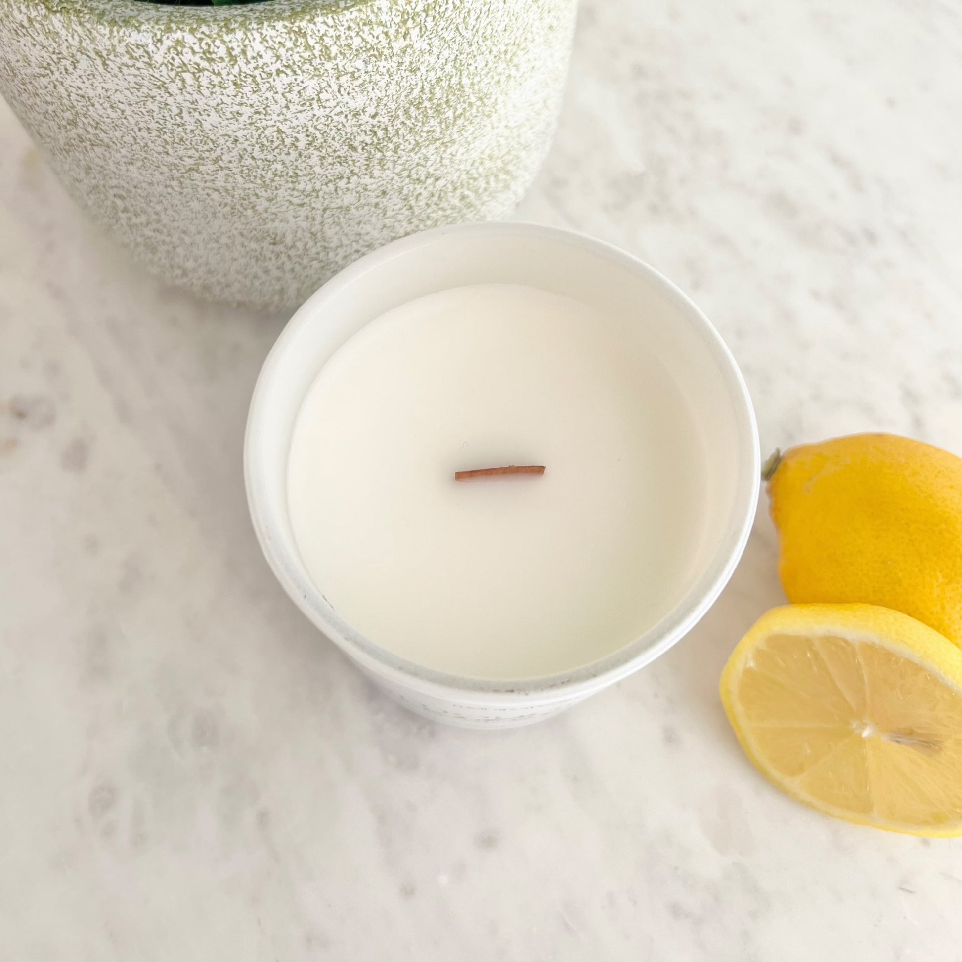 arial shot of the lemongrass verbena candle and crackling wooden wick