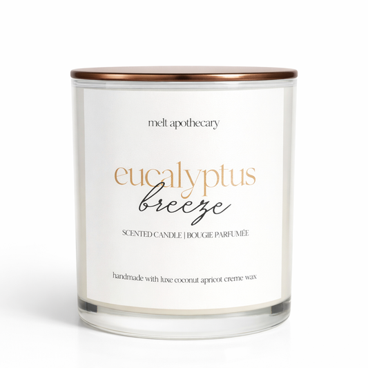 Candle with 'eucalyptus breeze' label on a white background