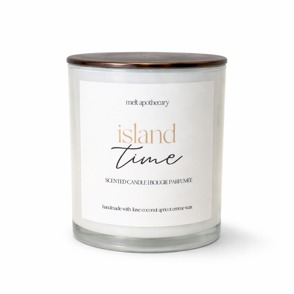 melt apothecary candle with 'island time' label on a white background