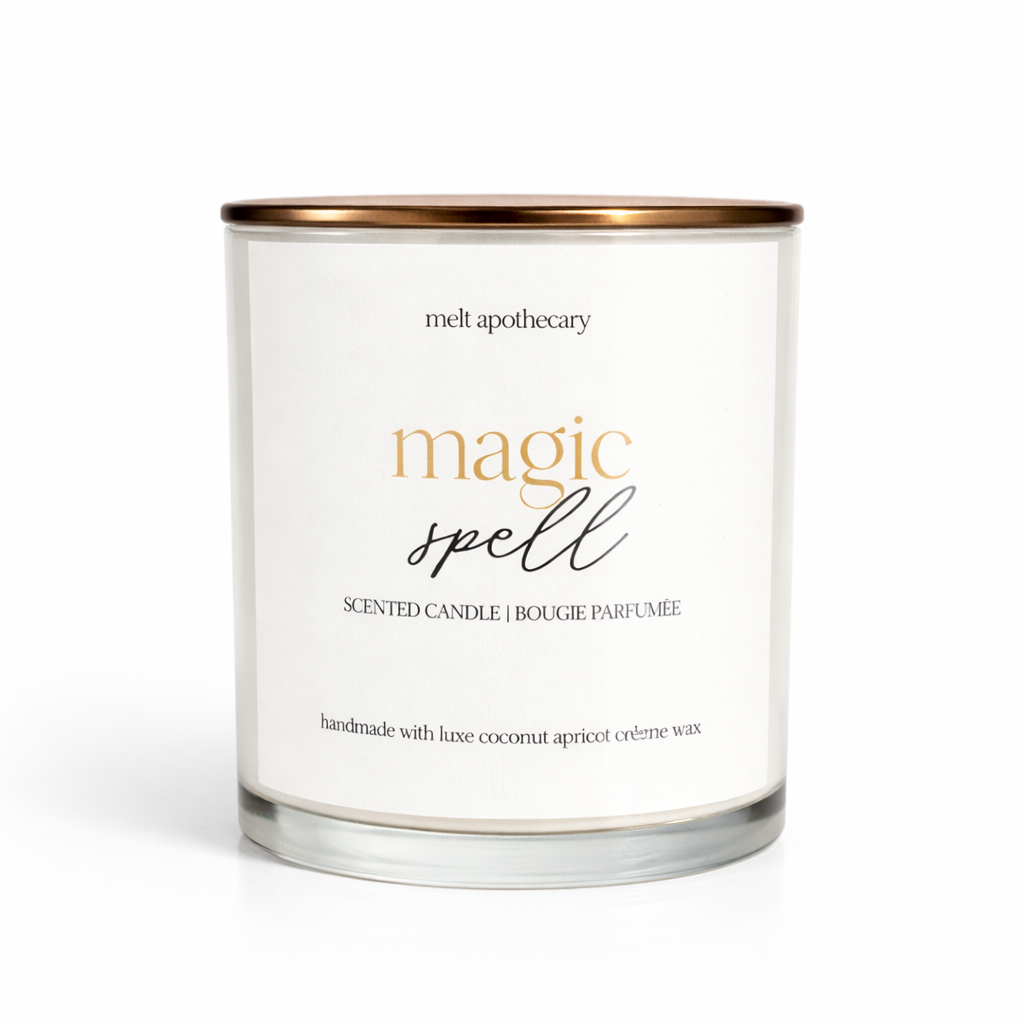 Candle with 'magic spell' label on a white background